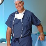 Surgeon wearing blue scrub